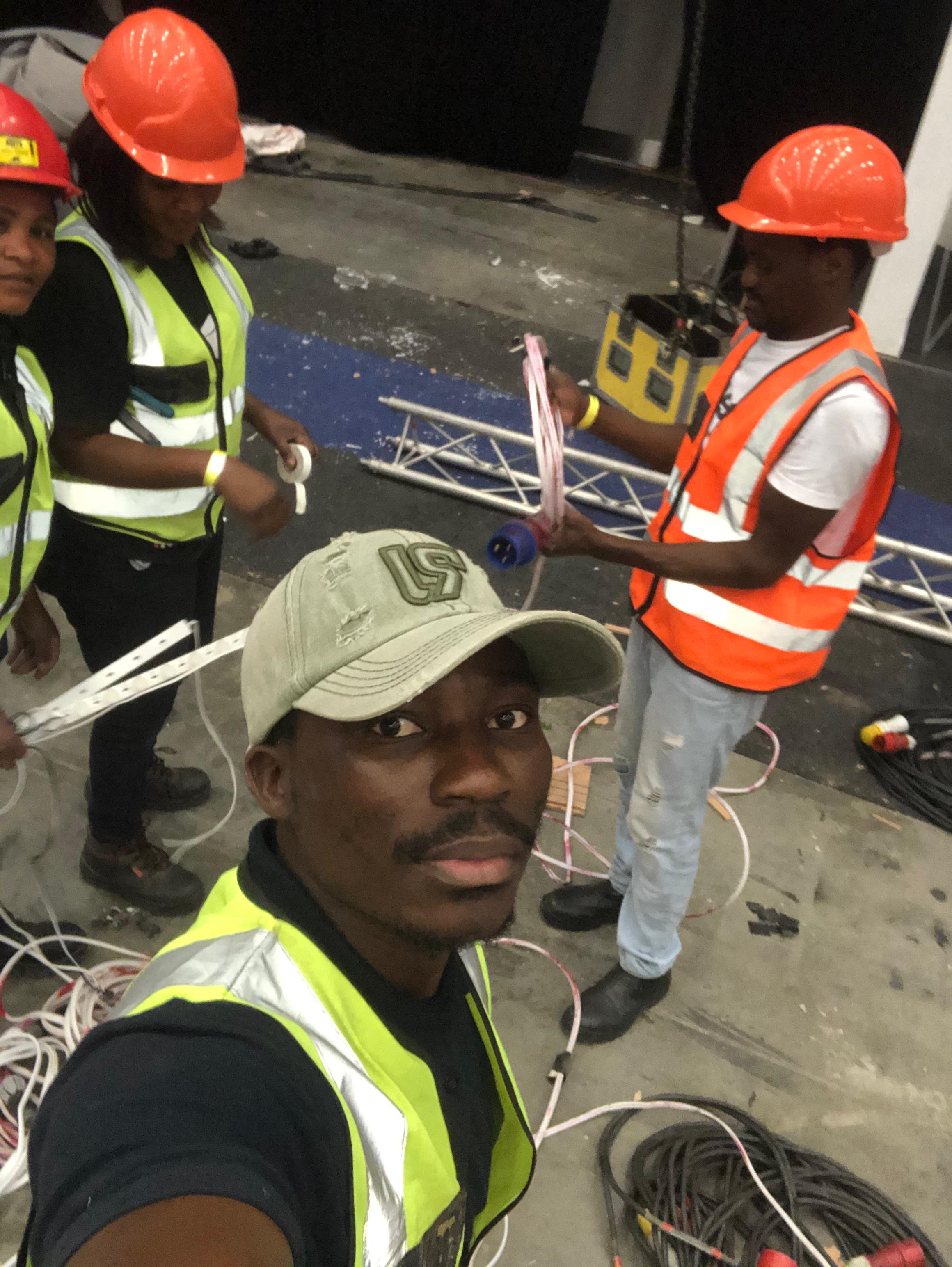 The Artisan Electrical team on site in hi-vis and hard hats